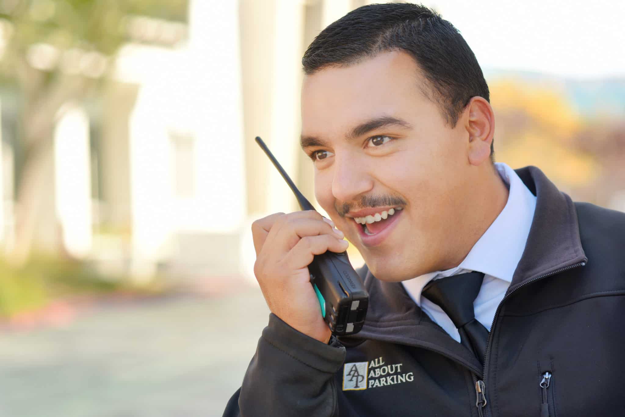 All About Parking team member in professional uniform