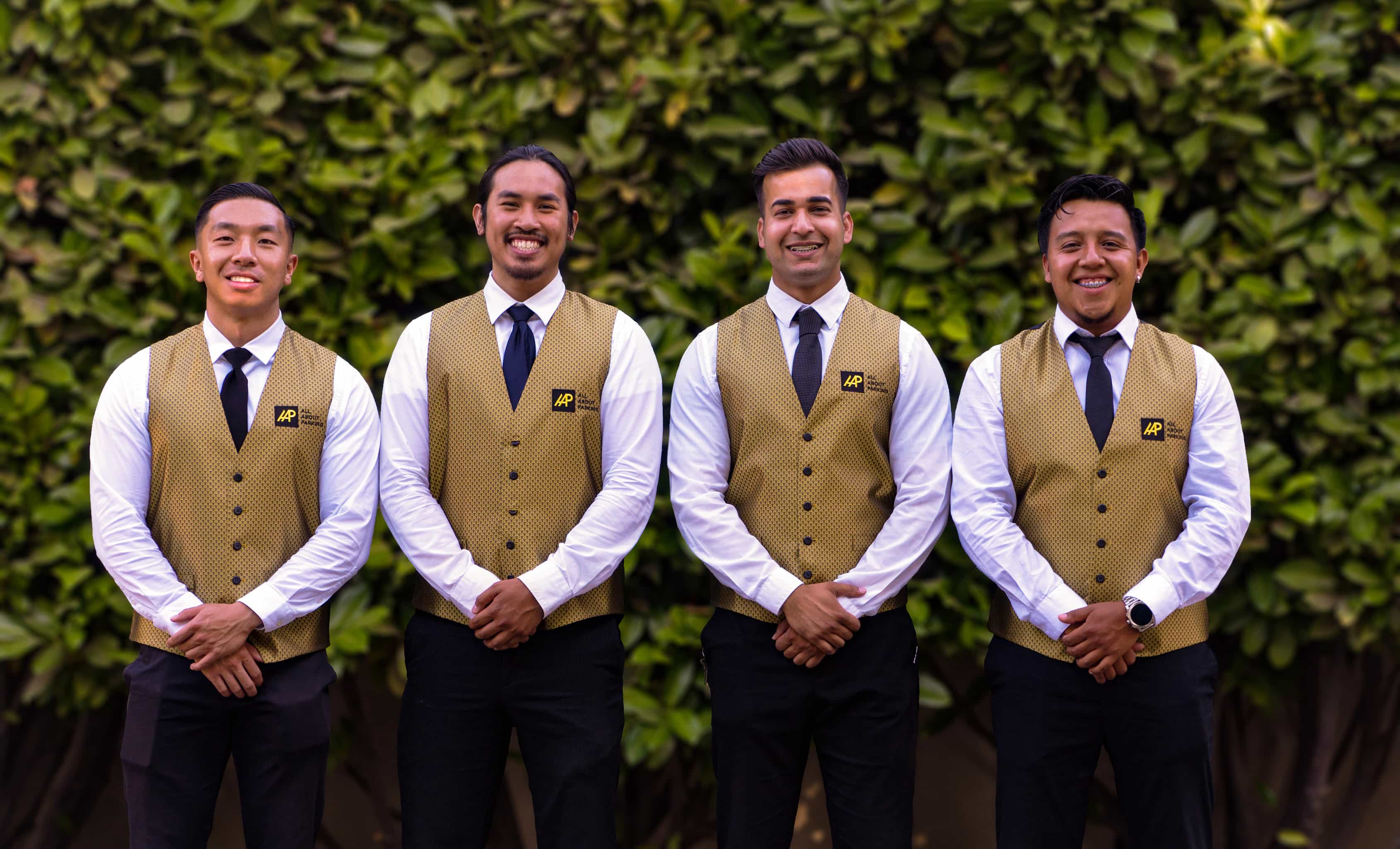 All About Parking valet team in matching vests ready for service
