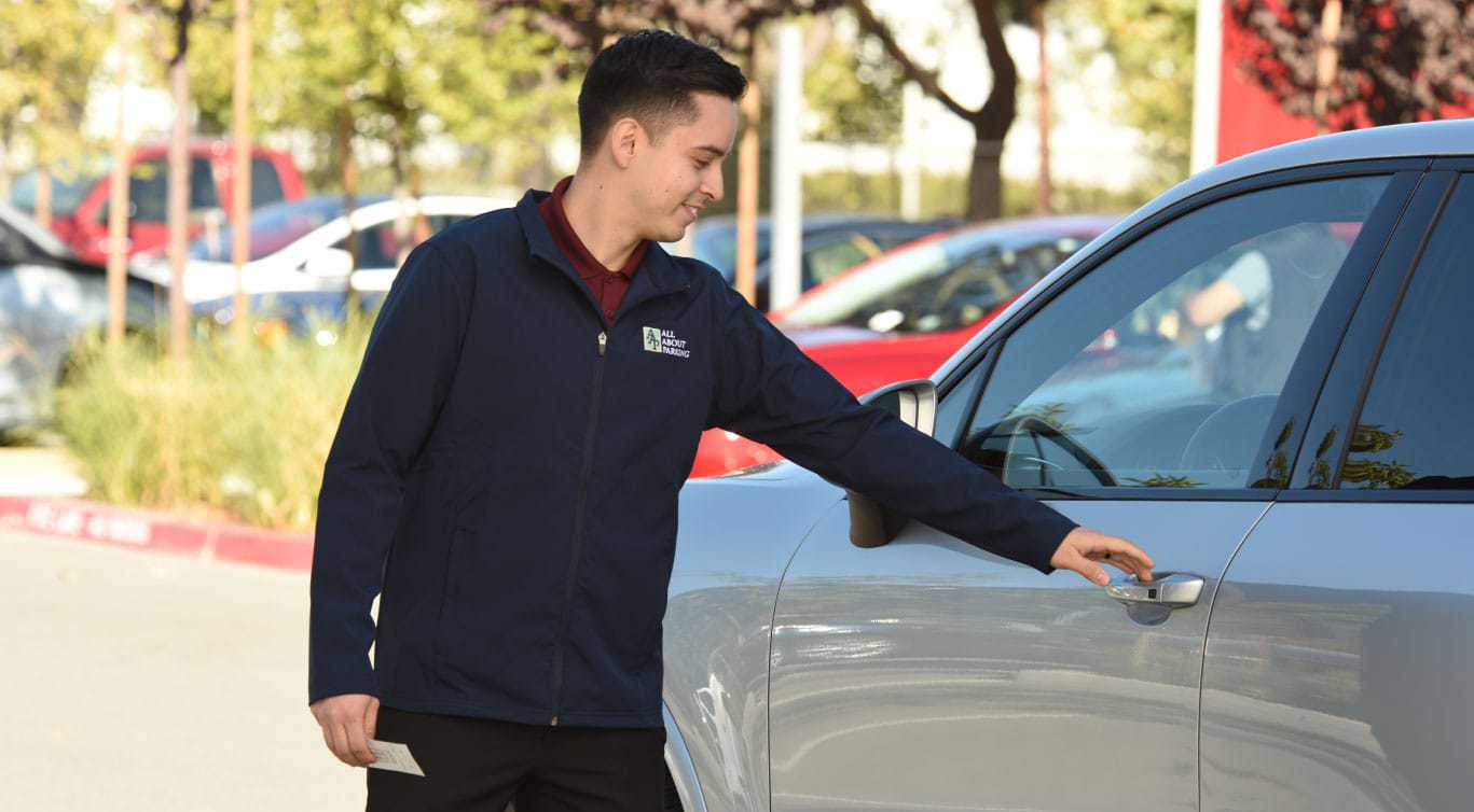 Guest vehicle being handled by a valet attendant